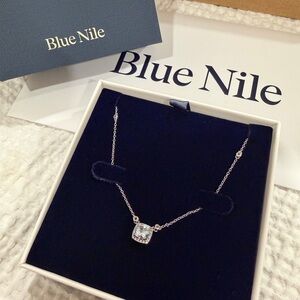 Blue Nile 6mm cushion white topaz halo pendant